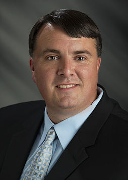 Pictured is Joel C. Hill, director of choral and vocal music on the Holmes Goodman Campus, who was recently named a Joint Board member and Conference Registrar for MMEA and ACDA.