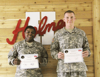 Pictured are Holmes Community College Magnolia GOLD students (left to right) Johnell Hartley from the Goodman Campus and Lane McTaggart from Ridgeland Campus. The two students were each honored by their peers with Certificate of Achievement Awards during the last week school.