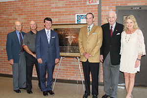 Pictured with the rendering of the plaque for the new Samuel O. Massey, Jr., M.D. Science and Mathematics Auditorium are: (From L to R) Director of Annual Giving, Jack Holmes; Holmes Board of Trustees President, Walter Alford; Holmes President, Dr. Jim Haffey; Honoree, Dr. Samuel Massey, Jr.; Holmes Development Foundation Board President, Dr. Don Phillips; and Executive Director of the Holmes Development Foundation, Dr. Lindy McCain.