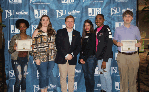 Growl staff garners awards at McDavid Journalism Conference