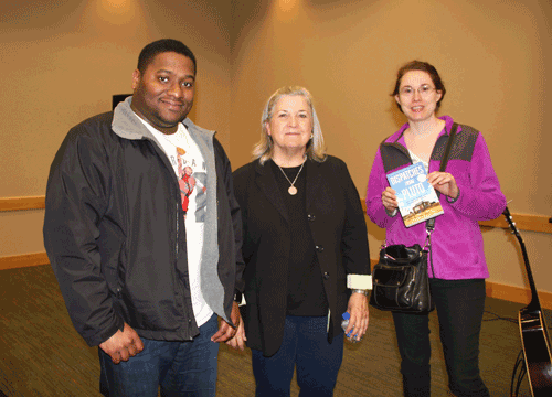Holmes students (left) Joshua Jackson and (right) April Valentine stop for a photo with Tricia Walker following the first “Exploring the Mississippi Delta” series event. Valentine won the book, “Dispatches from Pluto: Lost and Found in the Mississippi Delta,” in a drawing, and will be in attendance for the book discussion on Thursday, March 22, at 12:30 pm. in the McGowan Workforce Training Center.