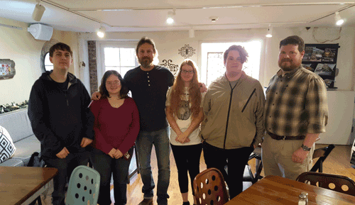 Pictured are (left to right) Goodman Campus Creative Writing students Ethan Burton and Elizabeth Howell; novelist Michael Farris Smith; students Abigail Proctor and Chris Kalil, and English instructor Chad Moorer at Smith's book reading/signing at Turnrow Book Co. in Greenwood.