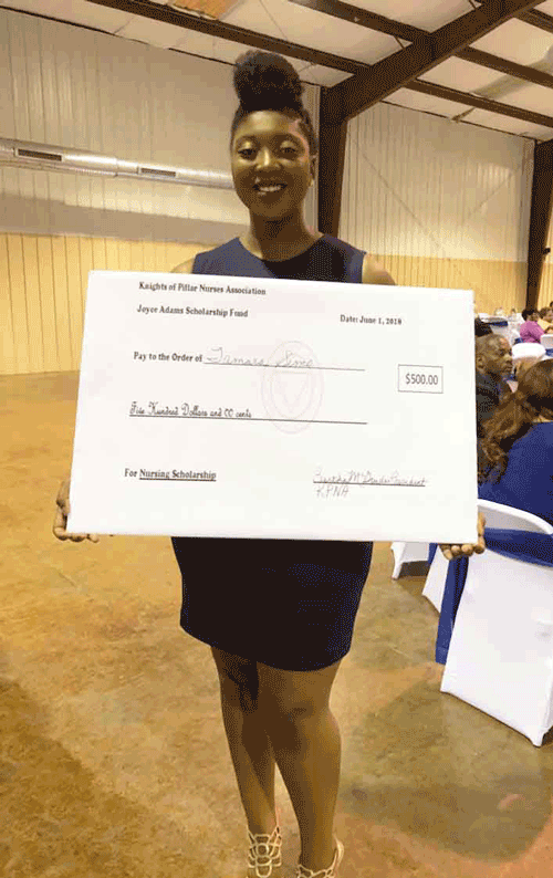 Pictured is Tamara L. Sims, a Holmes Associate Degree Nursing sophomore who received a $500 Joyce Adams Scholarship from the Knights of Pillars Nurses Association.