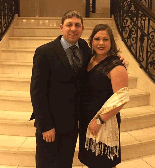 Pictured is Heather Wood with her husband, James.