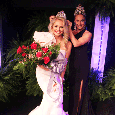 (right) 2018 Most Beautiful Georgia Watkins of West crowns 2019 Most Beautiful Lily Kate Saxton of Benton during Holmes Community College's Parade of Beauties.