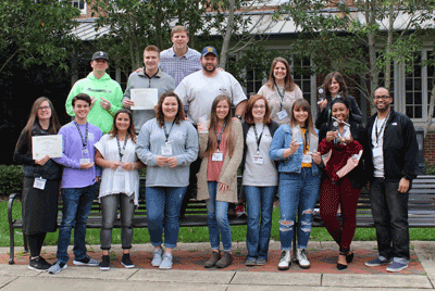 Pictured are Phi Theta Kappa advisers and students posing with their awards at the PTK Regional Conference held at Mississippi State University March 1-3. They are (front row, left to right) Adviser Bethany Miller, Bradford James, Macie Craddock, Kendall Preston, Courtney Dees, Adviser Cynthia Abel, Abigail Wilkerson, Chelsea Williams, Adviser Antoine Gates, (back row, left to right) John Miska, Tyler Sloan, Loftin Price, Adviser Will Alexander, Adviser Lisa Anglin and Jacquelyn Seuser.
