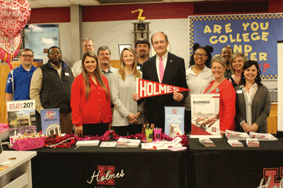 Pictured is (center) Mississippi Secretary of State Delbert Hosemann with Holmes instructors at a College and Career Fair in Canton on Feb. 14. Secretary Hosemann not only supports Holmes at local events, but provided a scholarship though the Hosemann Family Autism Foundation that enabled 20 teachers to complete PSY 2543 – Applied Behavior Analysis at Holmes.
(Photo credit: Leah Rupp Smith, Assistant Secretary of State of Communications)