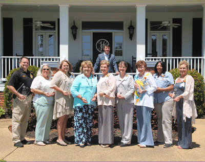 Pictured with (back) Holmes President Dr. Jim Haffey are the nine 2019 retirees. They are (left to right) Chief Christopher Dill, Nona Horne, Julie Muse, Dr. Fran Cox, Dr. Myra Harville, Dr. Donna Banks, Diann Parker-Barr, Jackie Thurman and Carolyn Ratliff.