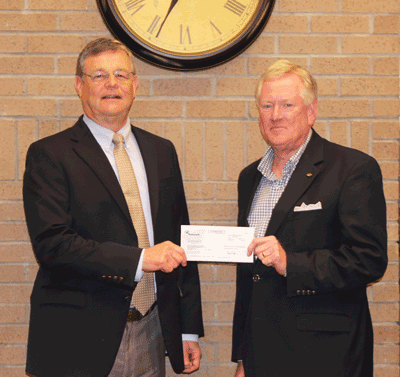 Holmes Ridgeland Campus Vice President Dr. Don Burnham accepts the donation on behalf of the Holmes Foundation from Barney Daly, President of Metro-Commercial Lending for Trustmark National Bank.