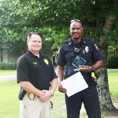 Pictured are (left to right) Chief Christopher Dill and Sgt. Carzell Cavett. Sgt. Cavett was named a 2019 Mississippi Top Cop recipient.